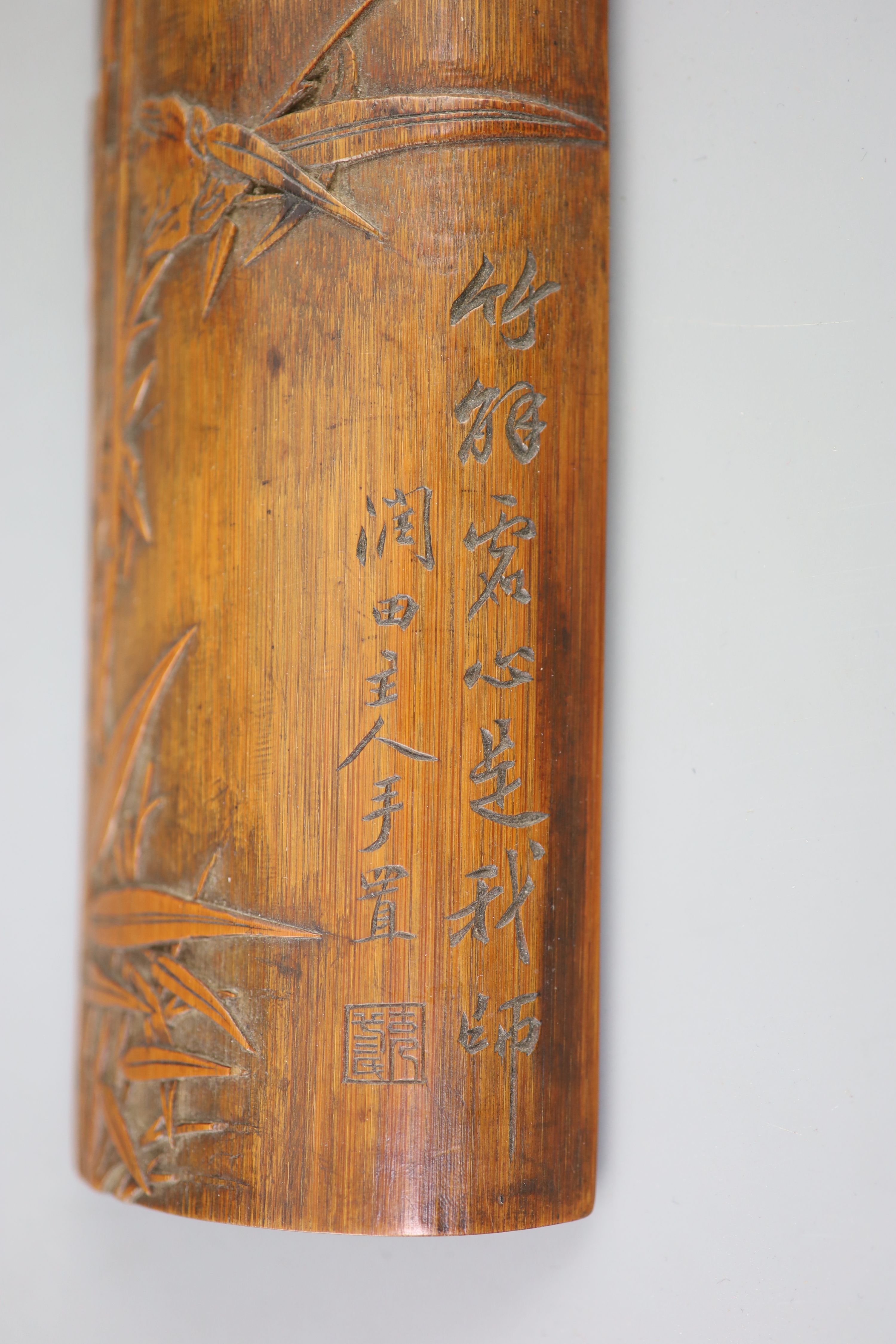A Chinese bamboo bamboo sprig wrist rest, 18th century,